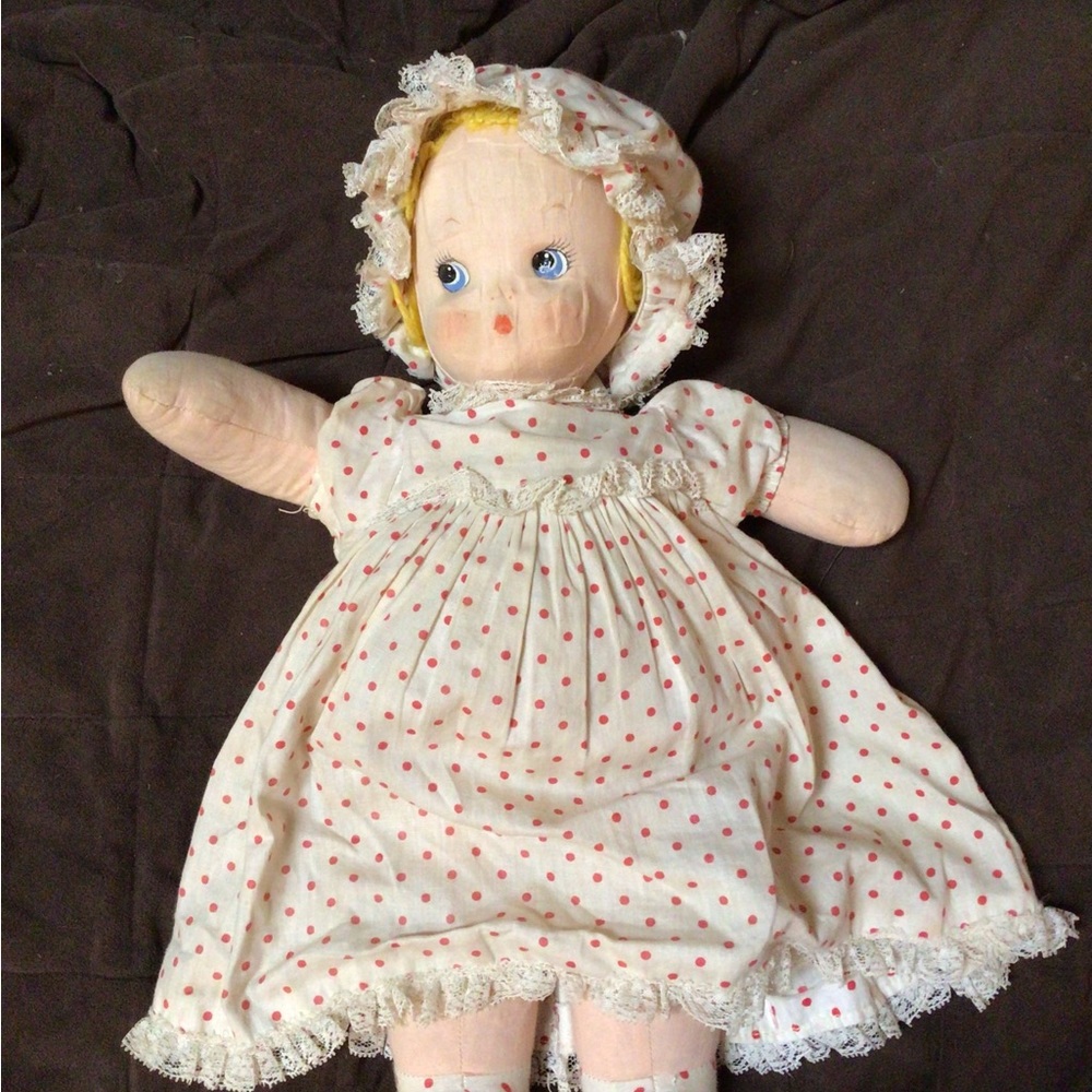 A collectible soft body baby doll with a pull-string musical feature
